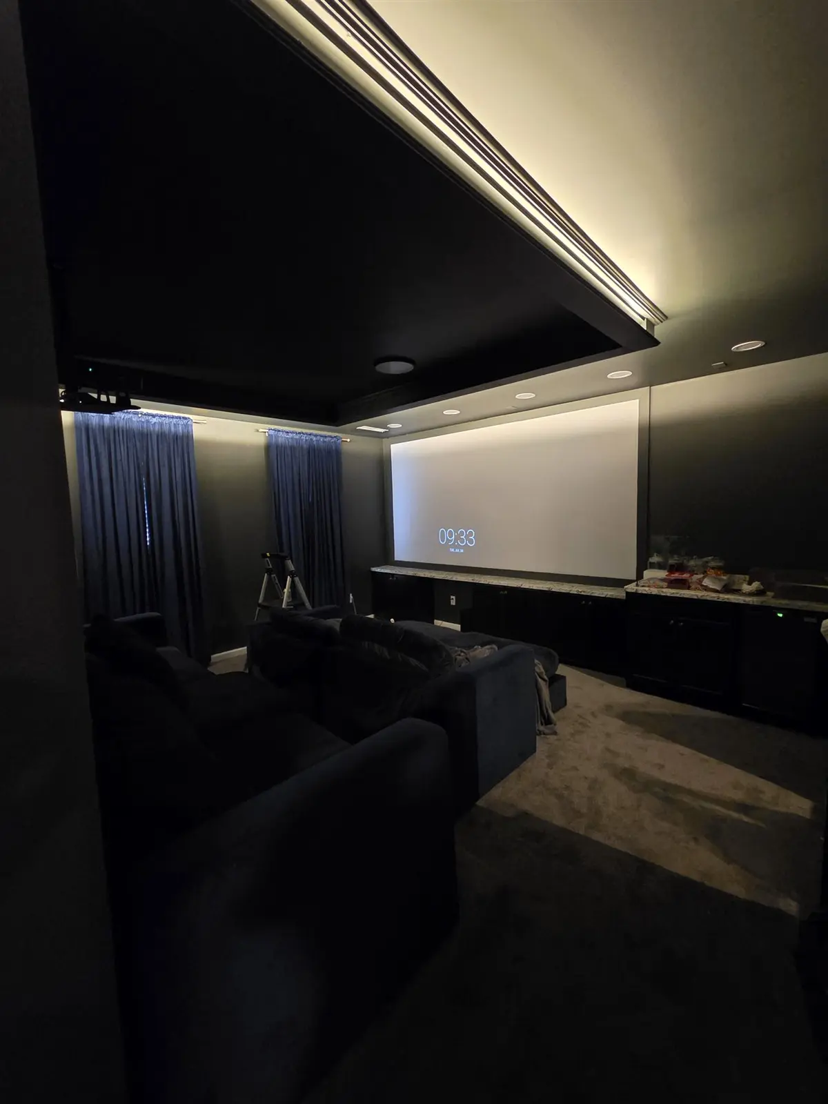 Home theater with recessed, cove and accent lighting