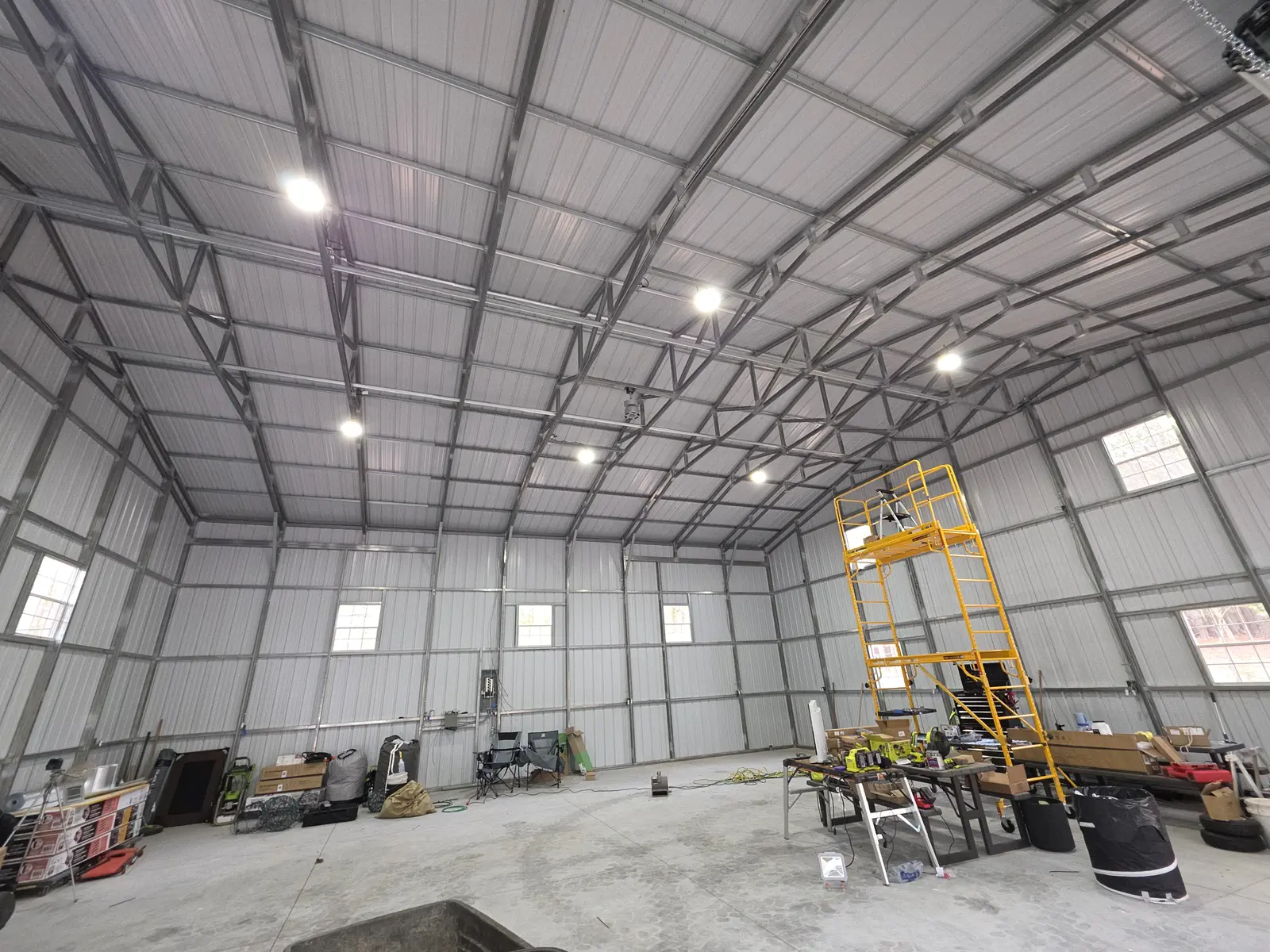 Forty-by-forty metal building illuminated by six high-bay lights