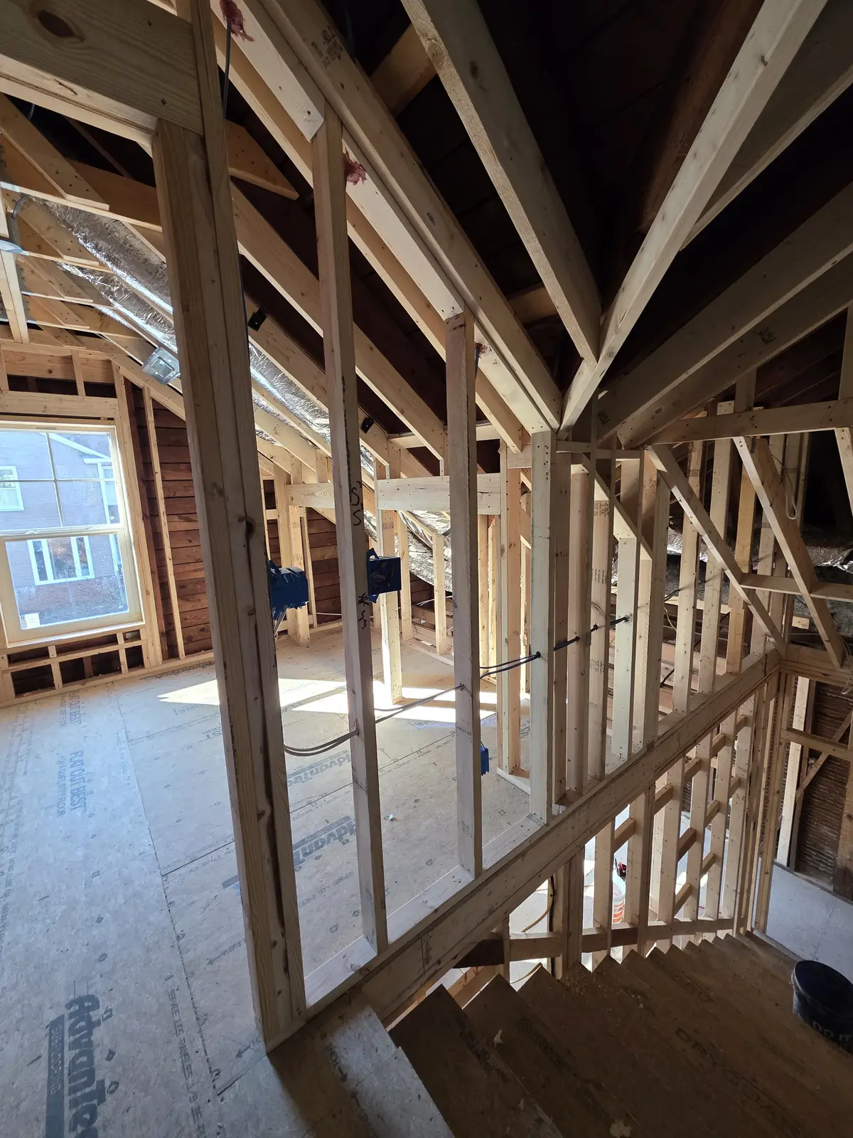 Second-floor electrical rough-in inside a century-old Plaza Midwood home